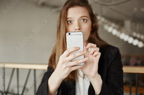 Obraz na plátně Girl was spying on boyfriend but got caught