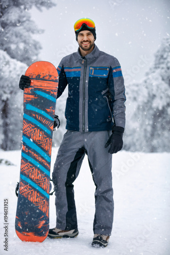 Winter sport- portrait of Snowboarder