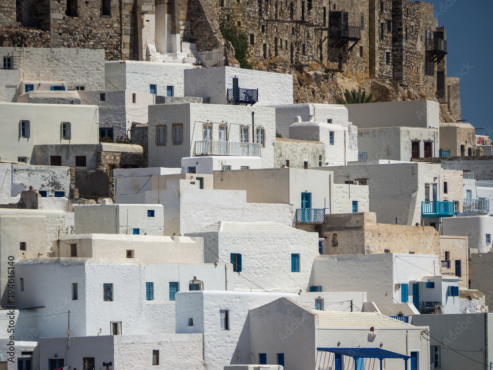Chora of Astypapaia island ,Greece at daytime a close up of the white houses with the colorful windows