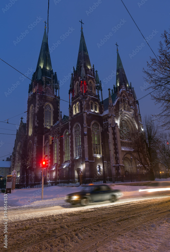 Naklejka premium Church of St. Olha and Elizabeth in night winter Lviv city, Ukraine