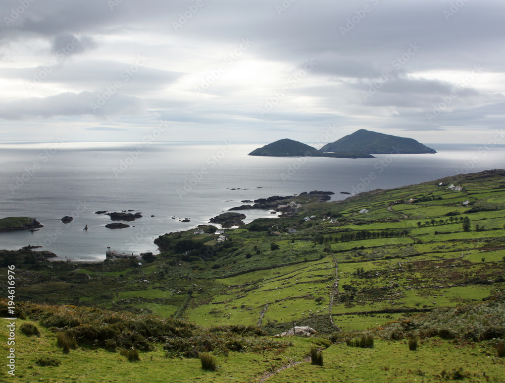 Fototapeta premium Green landscape along the Ring of Kerry - toned effect. Gloomy seascape in County Kerry - vintage effect. Ireland.