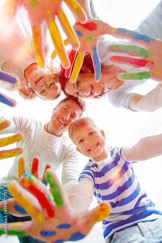 summer family with colour hands