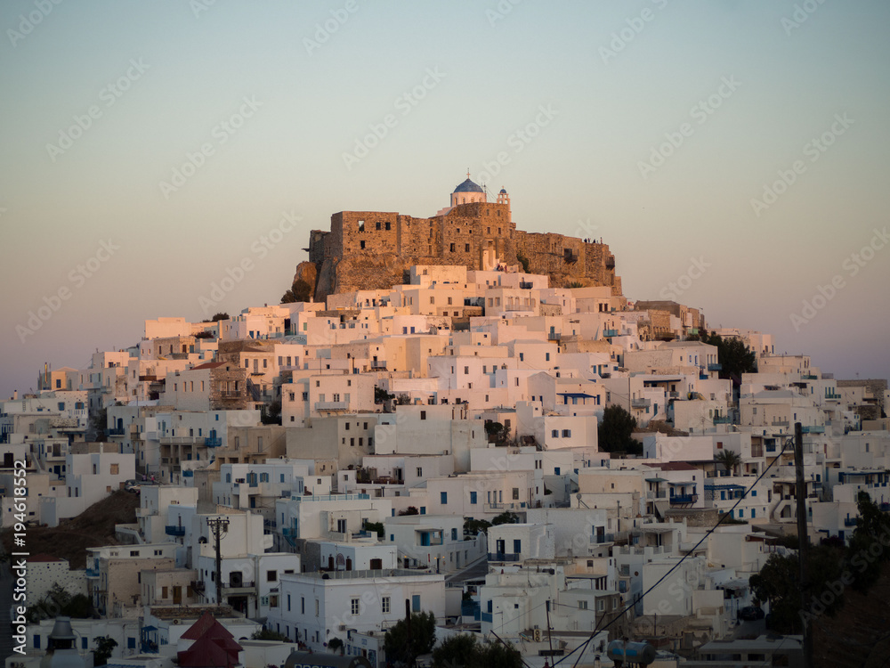 Sunset in Astypalaia ,Greece with a close up of the castle and the traditional white houses