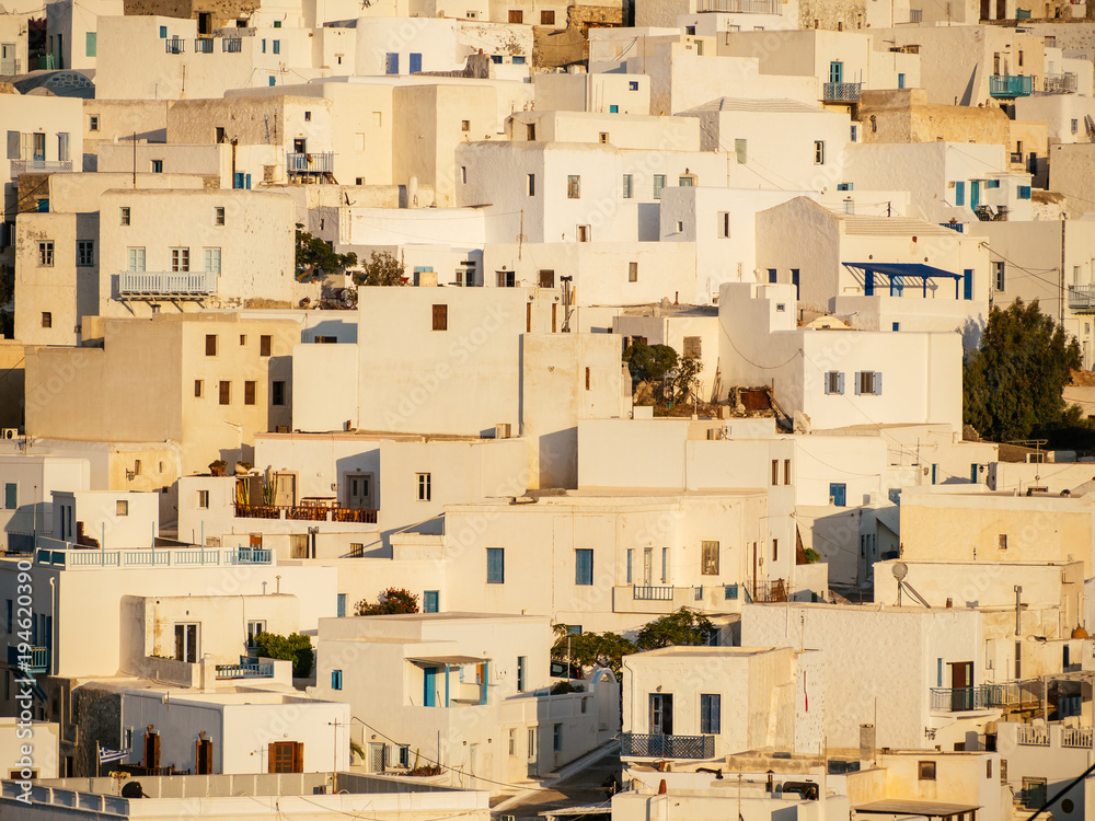 Close up of the white houses of Astypalaia island ,during the golden hour ,sunset