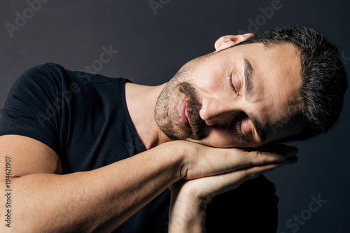 Sleepy man studio portrait © EnginKorkmaz