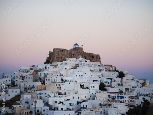 After sunset in Astypalaia ,Greece with a close up of the castle and the traditional white houses