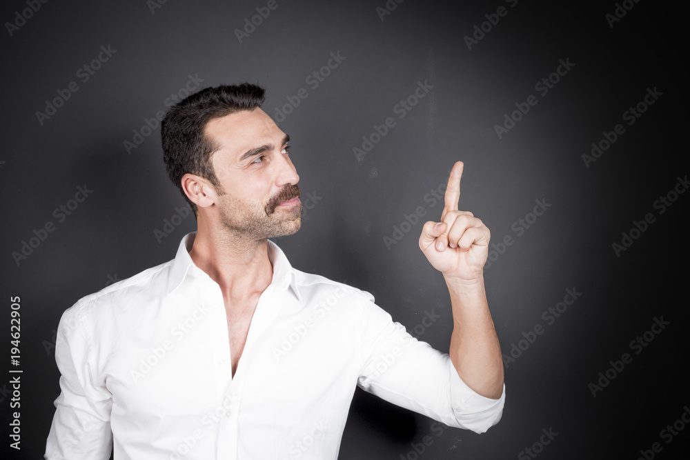 Young handsome man with beard and mustache studio portrait Young handsome man with beard and mustache studio portrait