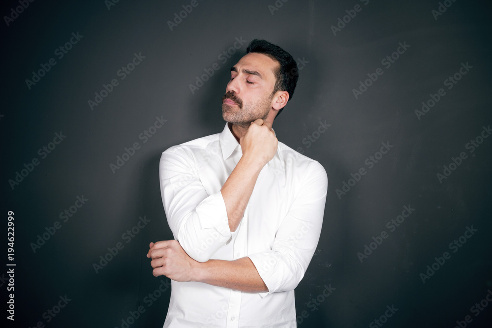 Young handsome man with beard and mustache studio portrait Young handsome man with beard and mustache studio portrait