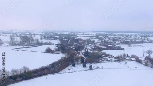 Snowy winter aerial scene fields Britain