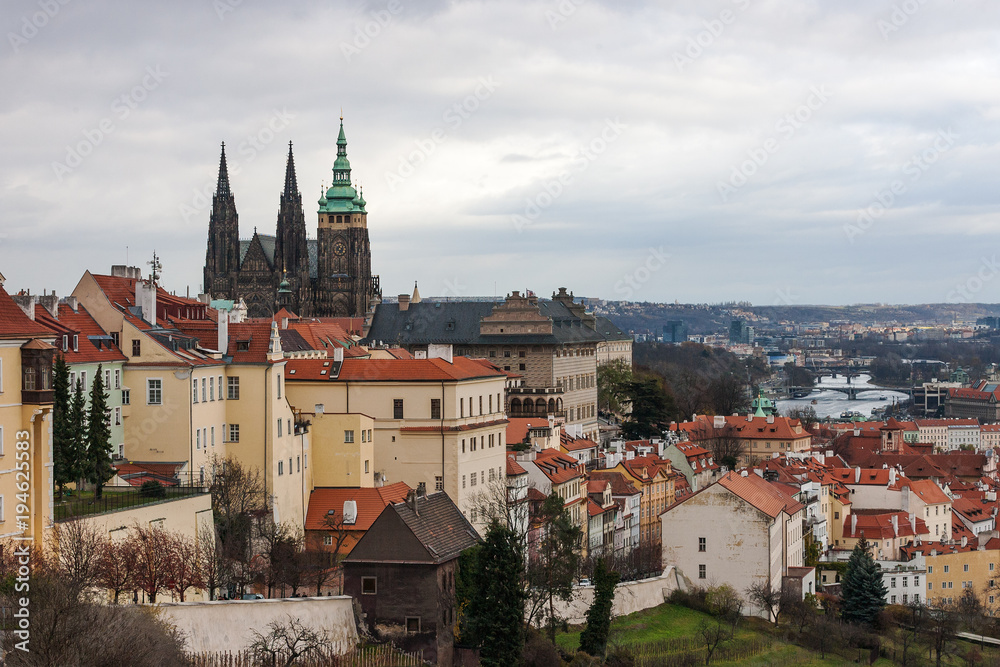 Prague Castle complex with gothic St Vitus Cathedral, Hradcany, Prague, Czech Republic. Panoramic aerial shot from Petrin Hill.