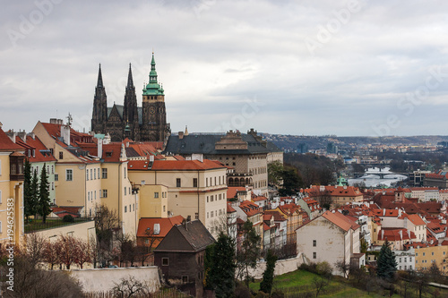 Prague Castle complex with gothic St Vitus Cathedral, Hradcany, Prague, Czech Republic. Panoramic aerial shot from Petrin Hill.