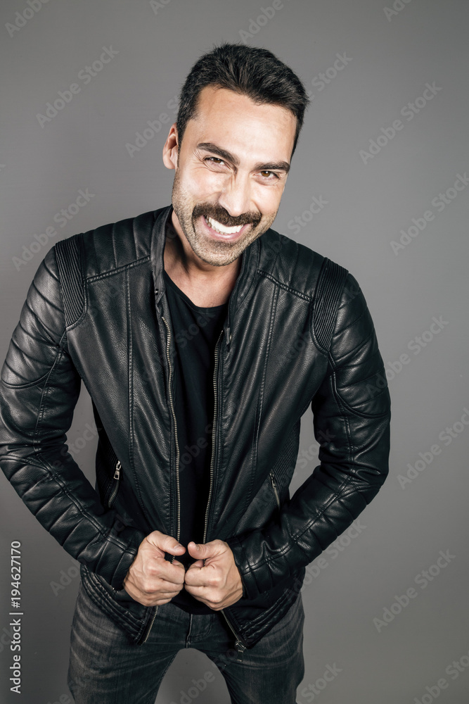 Young handsome man with beard and mustache studio portrait Young handsome man with beard and mustache studio portrait