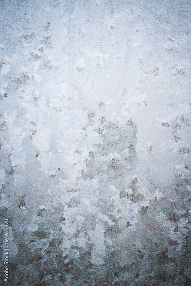 Winter frosty patterns on the frozen ice window Winter frosty patterns on the frozen ice window