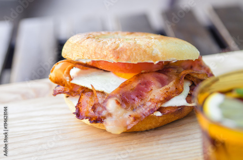 Bagel with bacon and egg