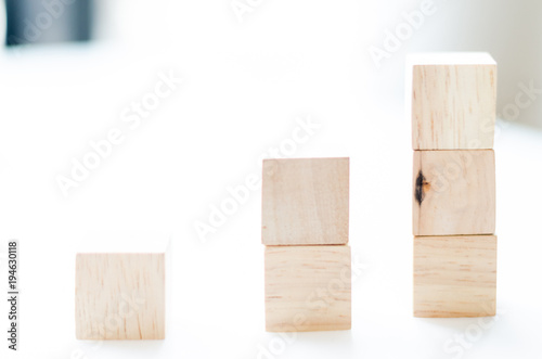 brown wood bricks tower on white background