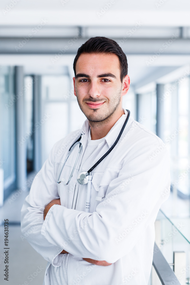Happy smiling cheerful male doctor