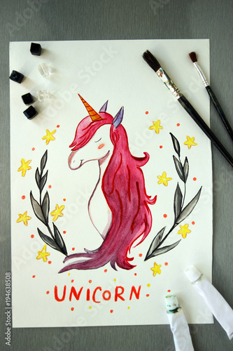 drawing of a cute unicorn on a table