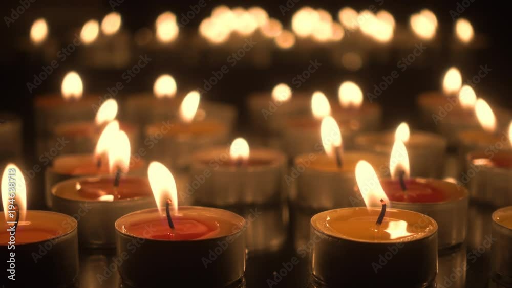 Burning church candles close-up
