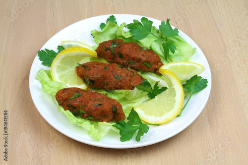 Turkish cuisine. Bulgur and lentil vegetarian dumplings ( Mercimekli Kofte )
