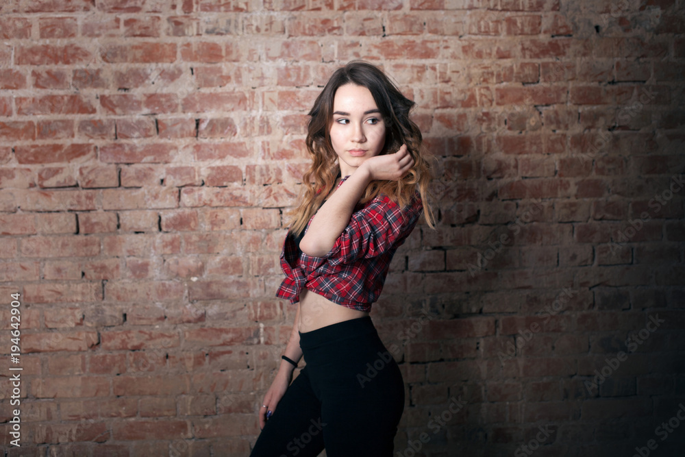 girl on brick wall background girl on brick wall background