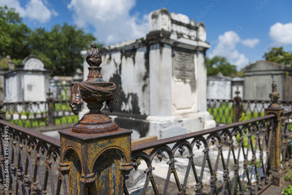 Fototapeta premium Detail of a tomb at the Lafayette Cemetery No. 1 in the city of New Orleans, Louisiana, USA