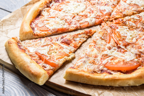 Wallpaper Mural Pizza slices on the board Torontodigital.ca