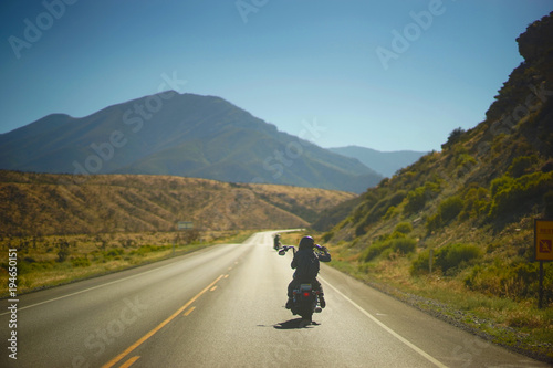 Motorcycles Through The Mountainside Valley photo