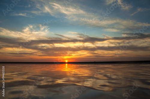 beautiful sunset at the sea © Evgenii