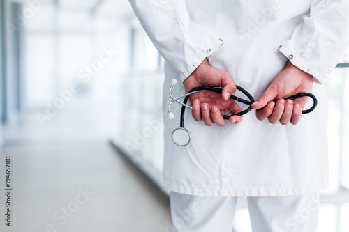 Doctor with stethoscope in hand