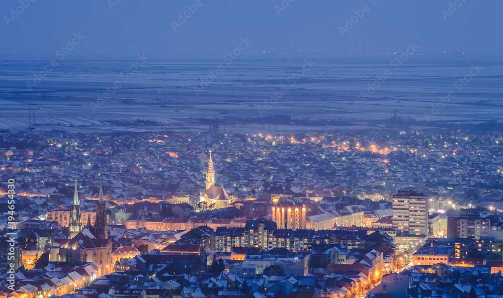 View on the city at blue hour from the viewpoint. Winter cityscape.