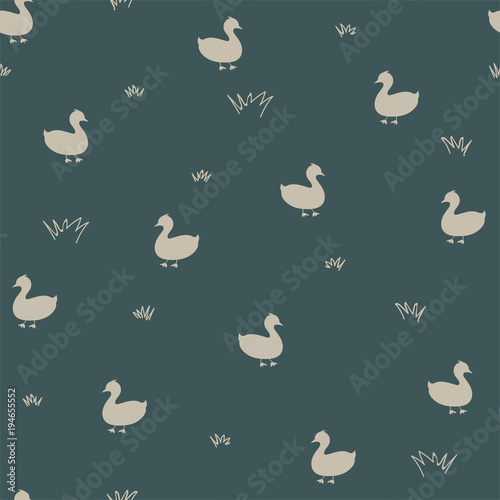 Seamless pattern with birds on a green background. Vector. 