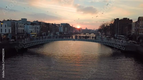 Wallpaper Mural silhouette of unrecognizible people crossing the Ha Penny bridge in Dublin Torontodigital.ca
