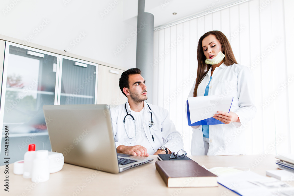 Doctors congratulate each other after successful work Doctors congratulate each other after successful work