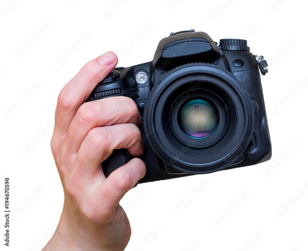 Female hand with modern DSLR camera with lens mounted. Photography equipment. Isolated on white. Female hand with modern DSLR camera with lens mounted. Photography equipment. Isolated on white.