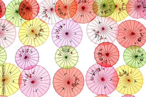 Bright colored umbrellas on a white background. Colorful flower umbrellas festival decoration.