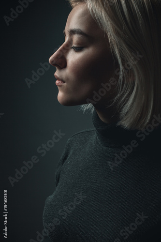 profile of a pretty blond woman. close up