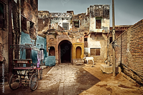 Old street of holy indian town Vrindavan. Uttar Pradesh, India. photo