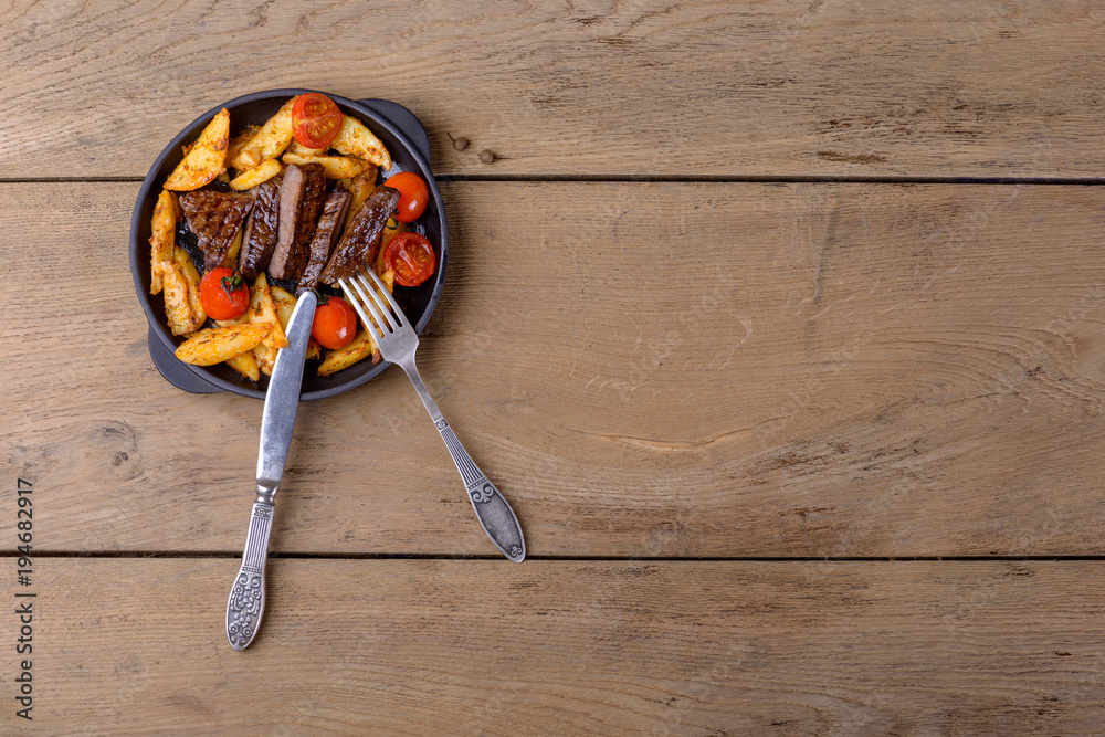 Sliced beef with potatos and tomatos Sliced beef with potatos and tomatos