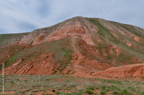 red sandstone outcrops on the slopes of Big Bogdo sacred mountain in Caspian steppe Bogdo-Baskunchak nature reserve  Astrakhan region  Russia