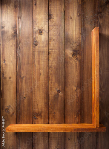 shelf at wooden background wall