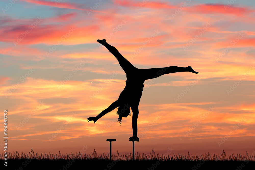 girl acrobat at sunset girl acrobat at sunset
