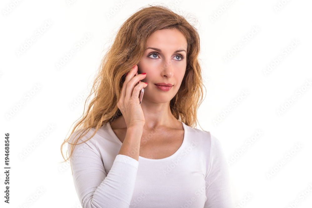 Beautiful caucasian woman in white t-shirt using smartphone. Studio shooting isolated on white Beautiful caucasian woman in white t-shirt using smartphone. Studio shooting isolated on white