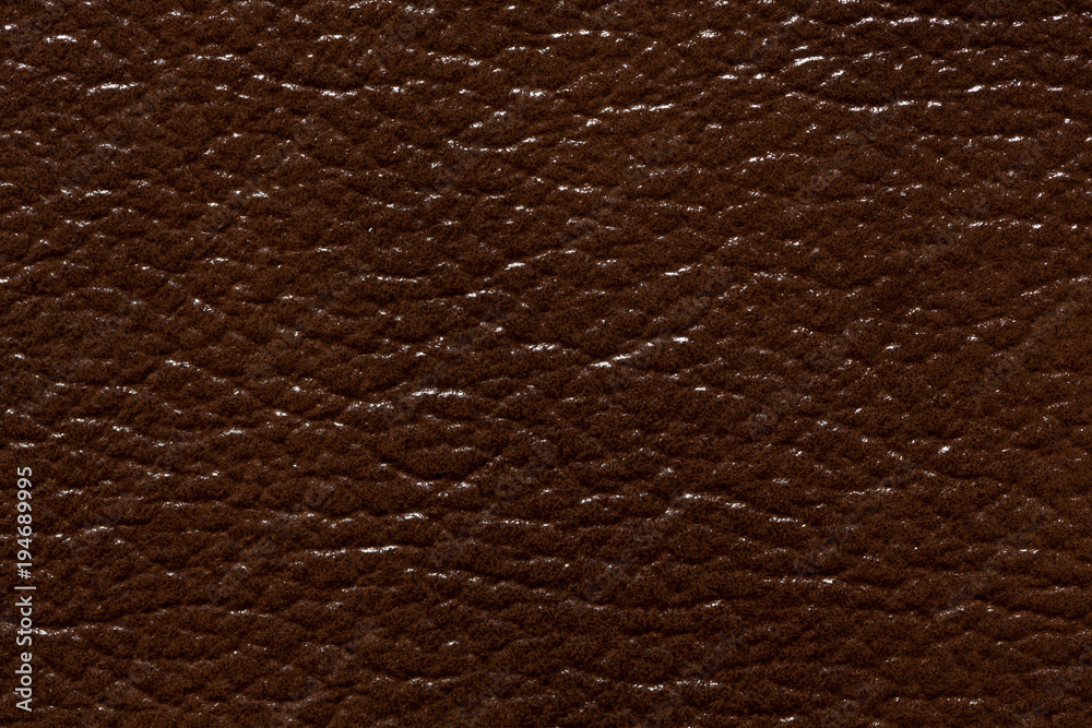Saturated brown expensive leather texture. Saturated brown expensive leather texture.