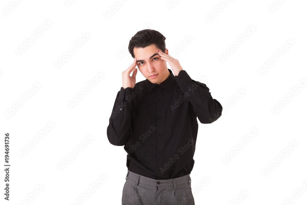 Young guy with stubble presses lips and hands at the temples, looks pensively, thinks over his future, clever expression concept, isolated over white studio background Young guy with stubble presses lips and hands at the temples, looks pensively, thinks over his future, clever expression concept, isolated over white studio background