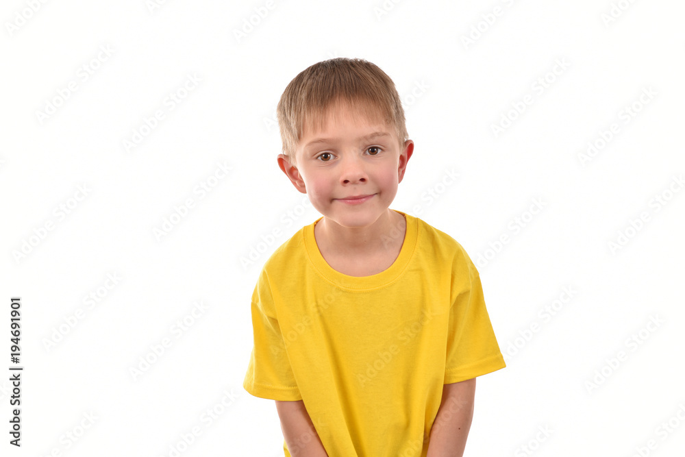 Cheerful boy on a white background. Isolated portrait of the child.Happy child. Cheerful boy on a white background. Isolated portrait of the child.Happy child.