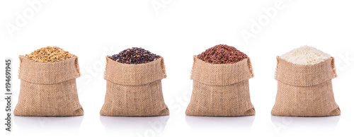 Set of Thai rice in brown small sack. Studio shot isolated on white background photo