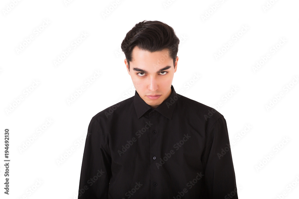 Dissatisfied and angry young man isolated on the white background Dissatisfied and angry young man isolated on the white background