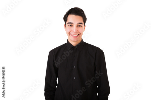 Young man smiling, feeling happiness, casual studio portrait over white