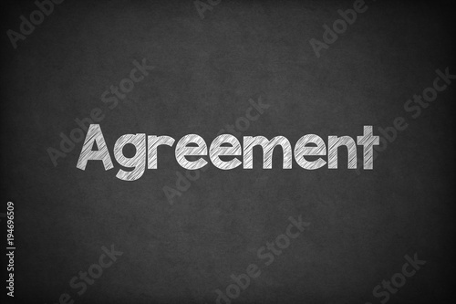 Agreement on Textured Blackboard.