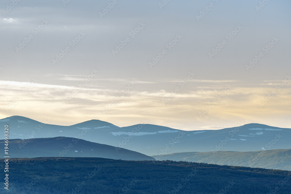 Sunset over a mountain landscape Sunset over a mountain landscape